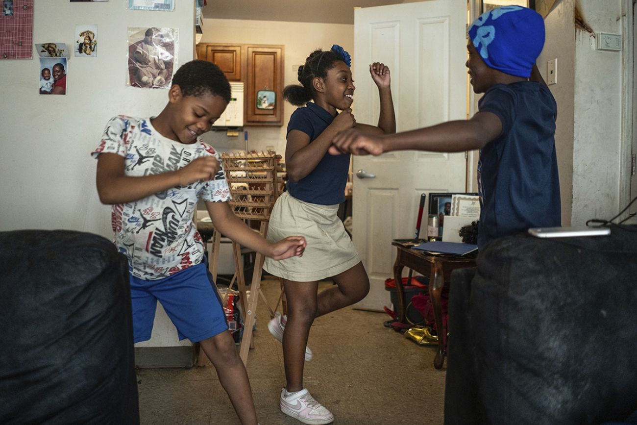 Children dancing in the living room