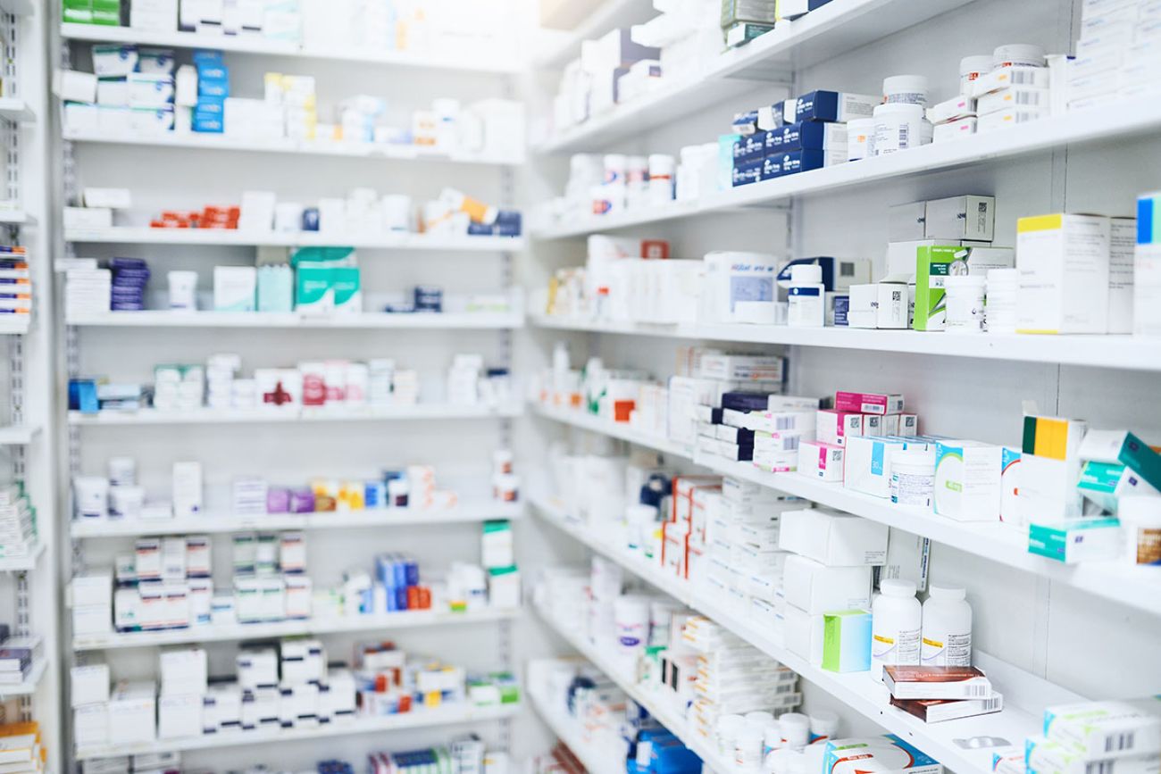 Pharmacy, pills and box with healthcare store, shelf and prescription care medicine.