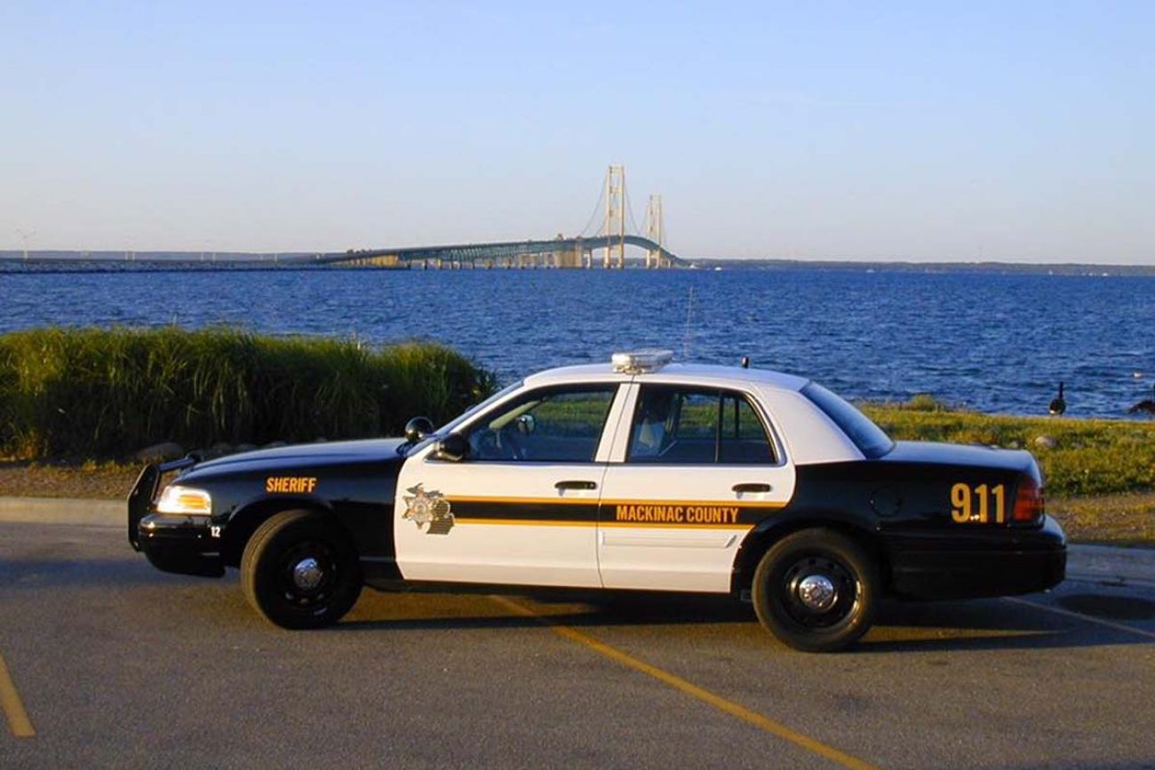 Mackinac County Sheriff’s Department cruiser. You can see the Mackinac Bridge in the background. 