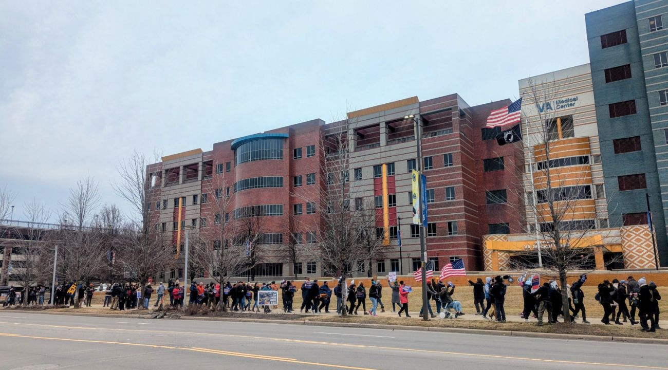 A line of protestors in front John Dingell VA Medical Center in Detroit, Michigan.