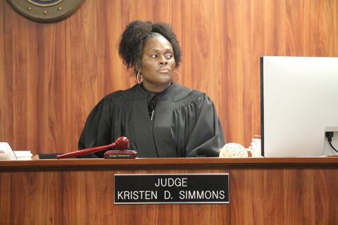 54-A District Court Judge Kristen Simmons sitting at her bench