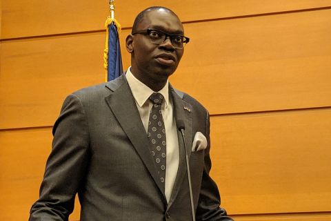 Michigan Lt. Gov. Garlin Gilchrist speaking into a microphone. 