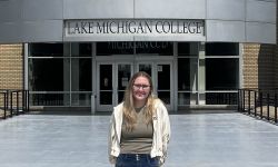 woman standing in front college