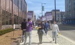 graduate students marching