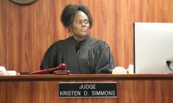 54-A District Court Judge Kristen Simmons sitting at her bench