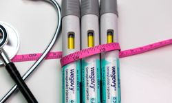Weight loss drugs with measuring tape