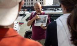 Michael Boettcher pointing to a paper 