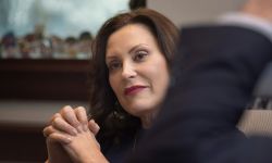 Gov. Gretchen Whitmer of Michigan sitting down