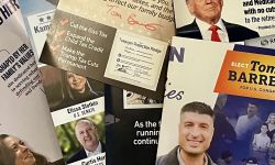 A pile of mail-in advertisements of political ads