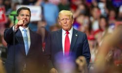 JD Vance and Donald Trump stand next to each other at a rally in Michigan