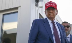 President-elect Donald Trump wearing a red "Make America Great Again" hat