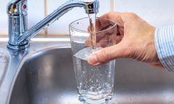 glass with tap water and water glass