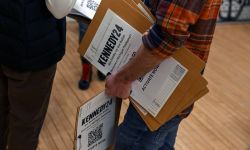 Man holds ballots