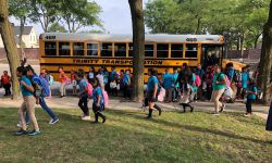 Kids coming out of a school bus