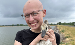 Ryann Jibson holding a bird