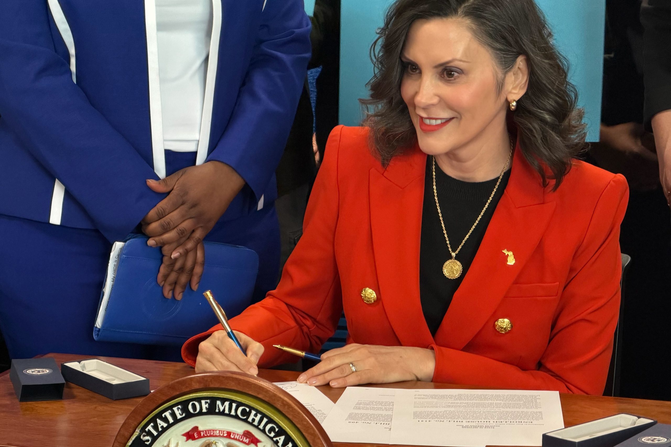 Whitmer signs classroom smartphone ban for Michigan schools. What to know