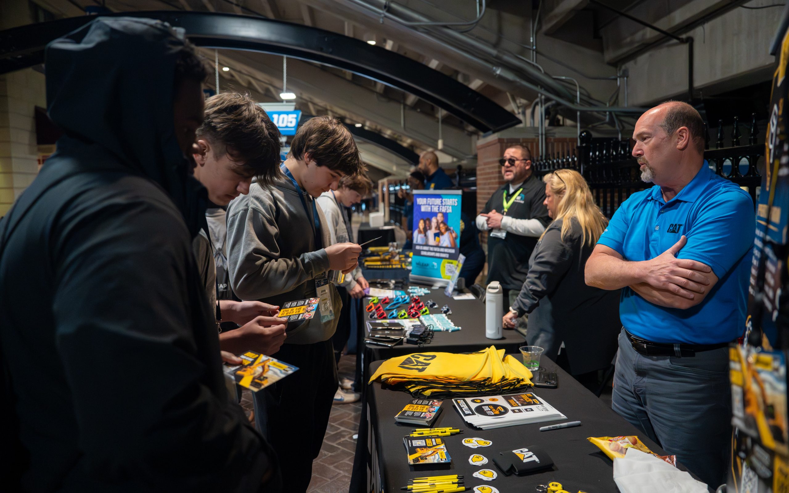 Michigan steps up work to persuade young men to go to college, get skills training