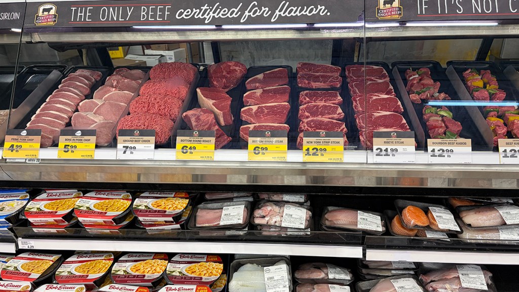 A meat counter at a grocery store.