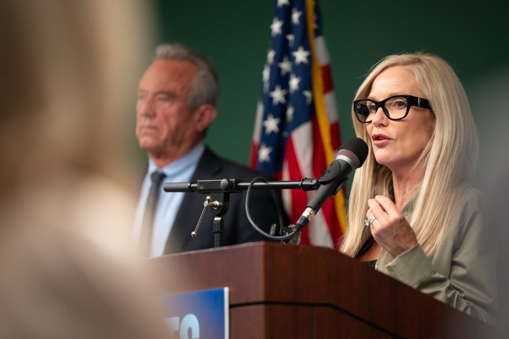 Woman speaks at podium