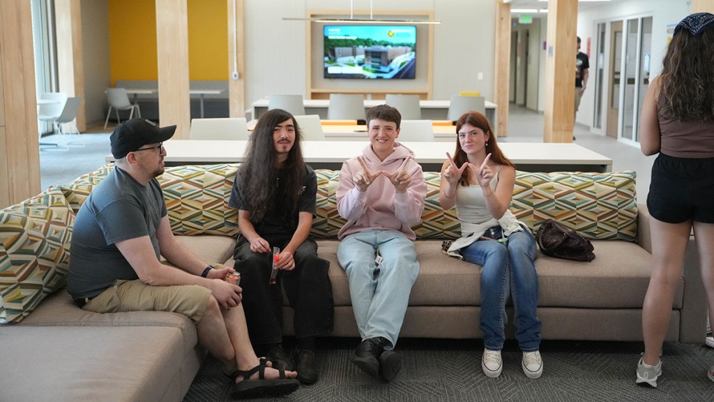 College sitting on a couch.