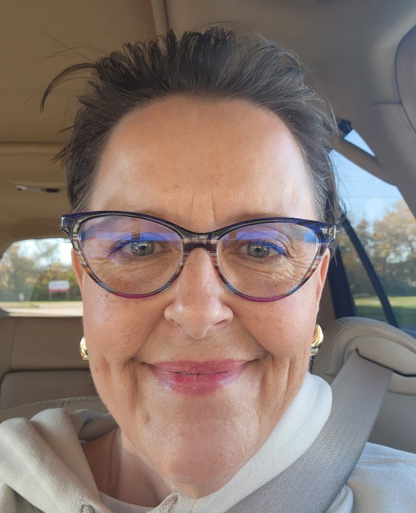 selfie of a woman in a car